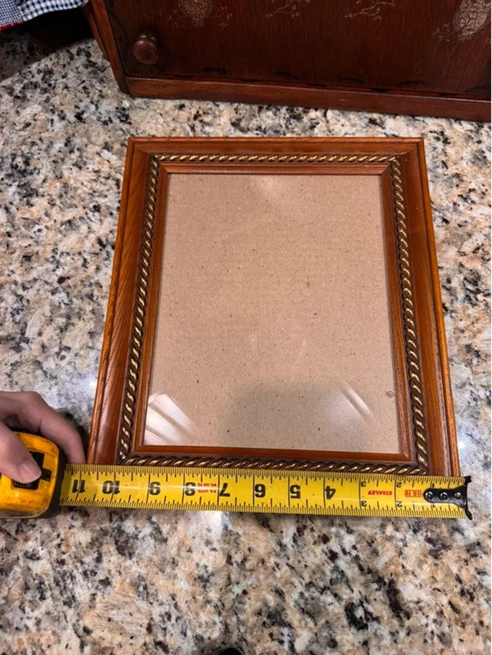 Wood frame with gold rope accent